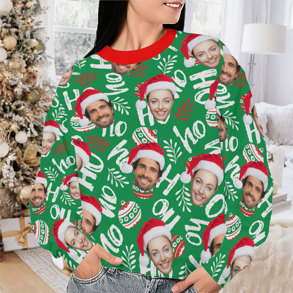 Person wearing a custom green ugly Christmas sweater with repeating face cutouts in Santa hats and white holiday lettering.