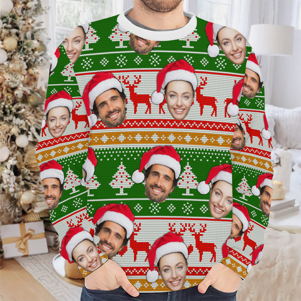 Close-up of a person wearing a custom face Christmas crewneck sweatshirt with green knit-style print, red reindeer and trees.