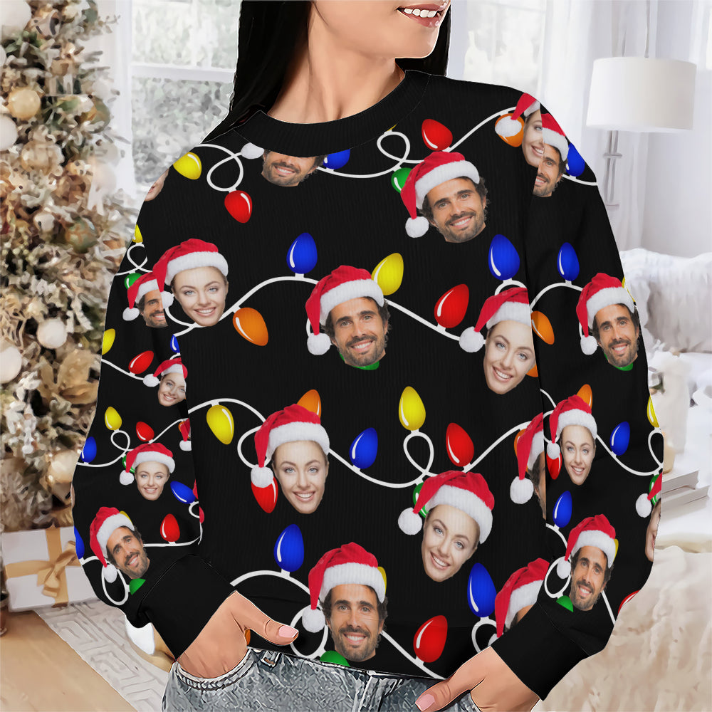 Close-up of the custom face crewneck sweatshirt showing repeated personalized family photo cutouts and bright holiday lights.