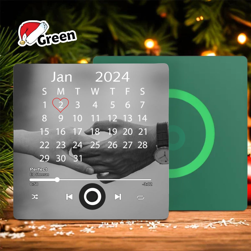Personalized Calendar & Music Fridge Magnet displayed in front of a green back option on a rustic wooden table with pine