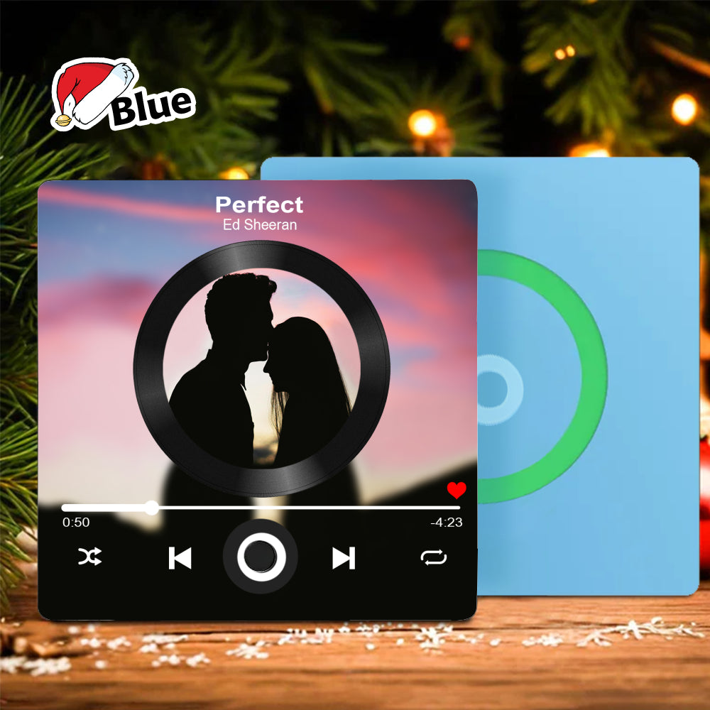 Square personalized music player fridge magnet in blue with a couple silhouette photo frame.