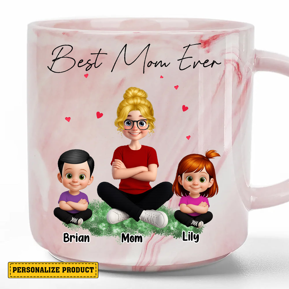 Close-up of the custom pink marble coffee mug showing the 'Best Mom Ever' text and personalized mother and kids avatars.