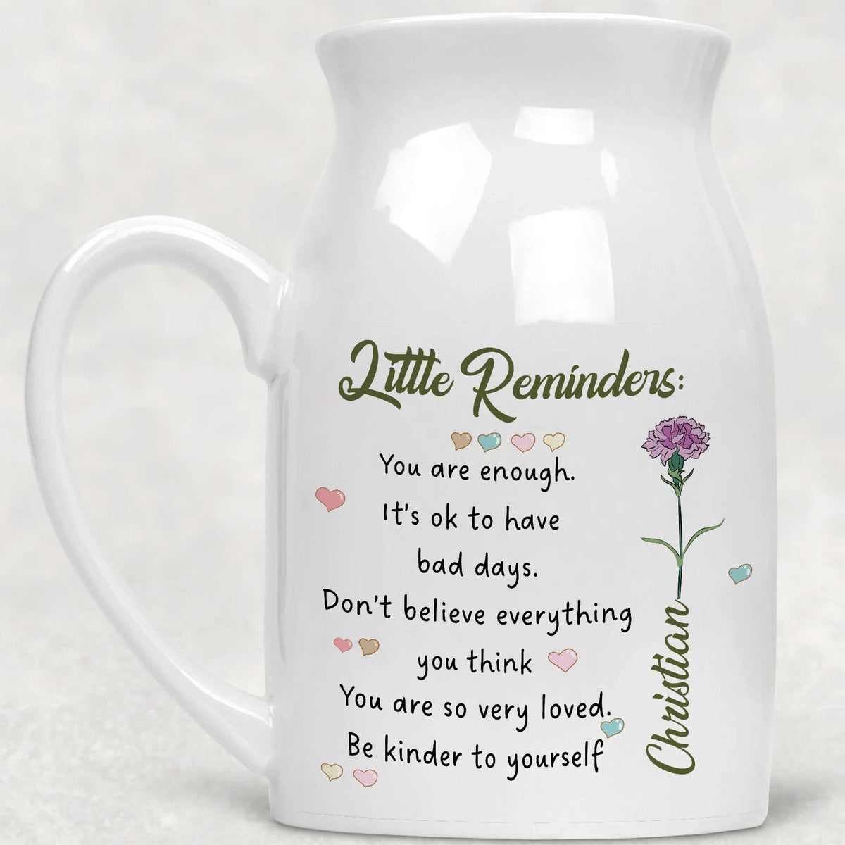 White ceramic flower vase with side handle, featuring Little Reminders motivational text, pastel hearts, and a custom birth