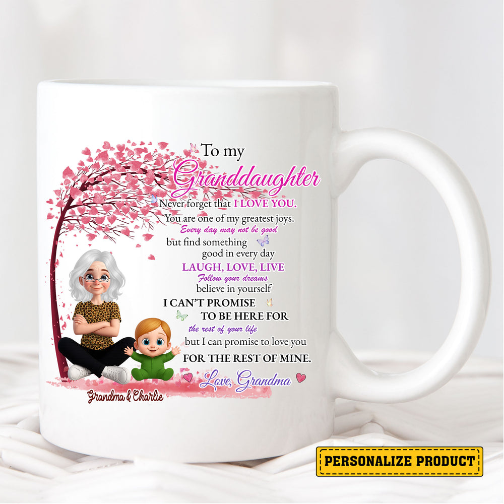 White custom granddaughter ceramic mug showing pink tree design and heartfelt quote.