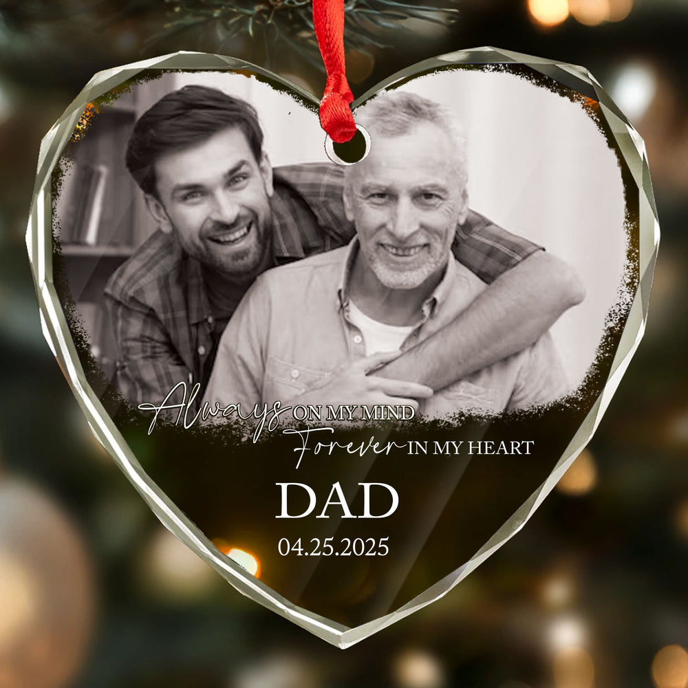 Close-up of a customized heart glass memorial ornament with a custom photo of a father and son, reading Dad and a