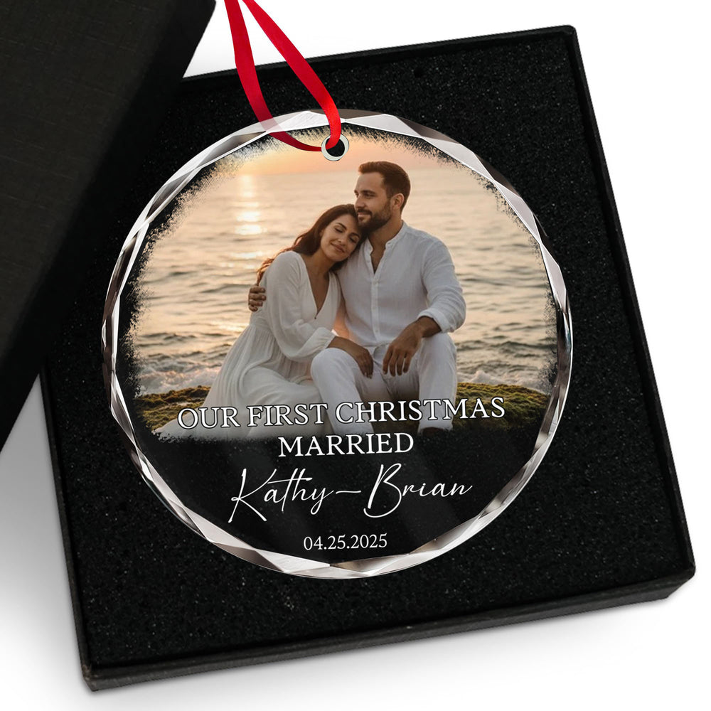 Personalized engagement ornament in a black gift box with foam insert and red ribbon.