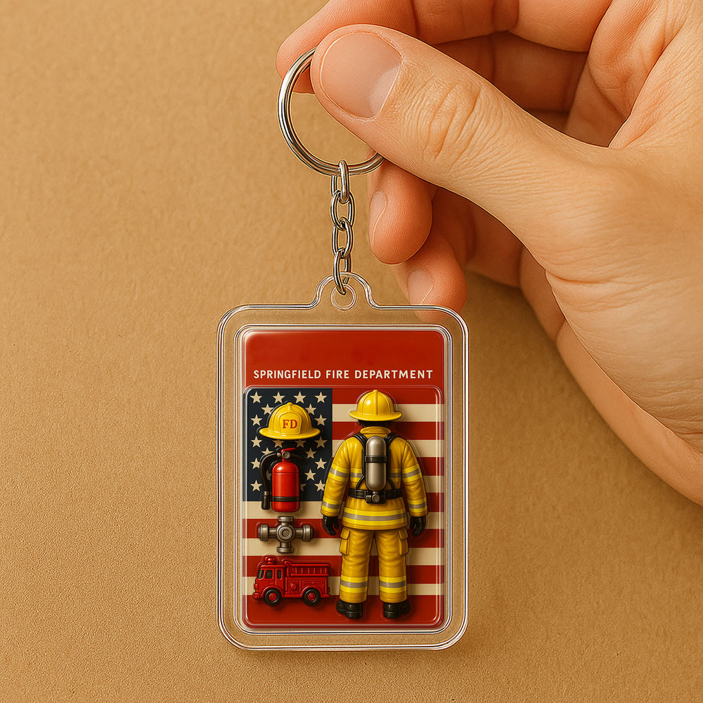 Hand holding personalized firefighter keychain with US flag design over brown surface
