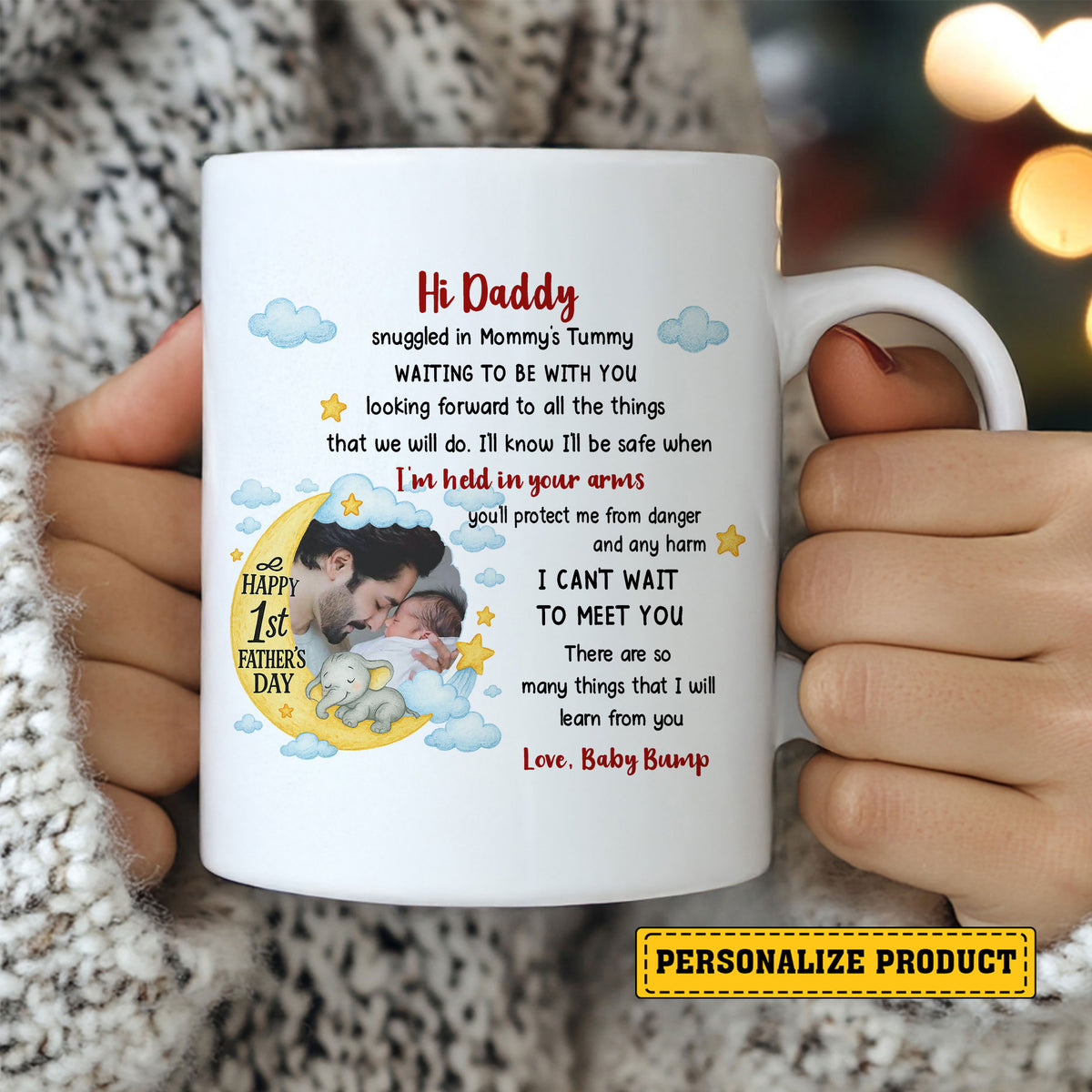 White ceramic mug held in hands, featuring custom photo in yellow crescent moon, blue clouds, stars, and Hi Daddy poem.