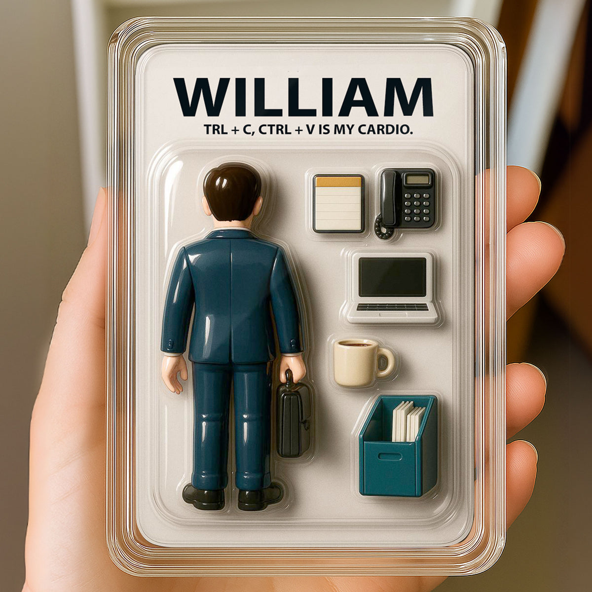 Personalized office worker 3D acrylic plaque held in hand featuring figurine in suit, laptop, and miniature desk items.