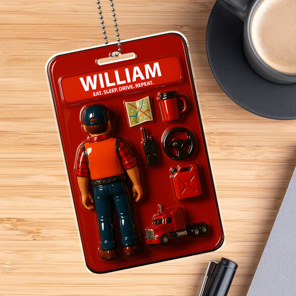 Personalized acrylic car ornament shaped like a red action figure blister pack featuring a trucker dad figure named WILLIAM