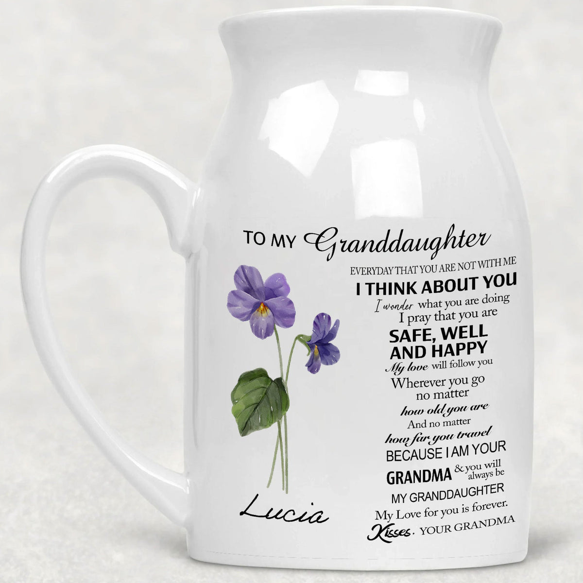 White ceramic flower vase with handle featuring purple birth flowers, granddaughter name Lucia, and heartfelt grandmother