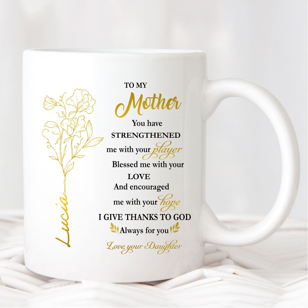 Front view of a white ceramic mug with To My Mom design on a textured white surface.