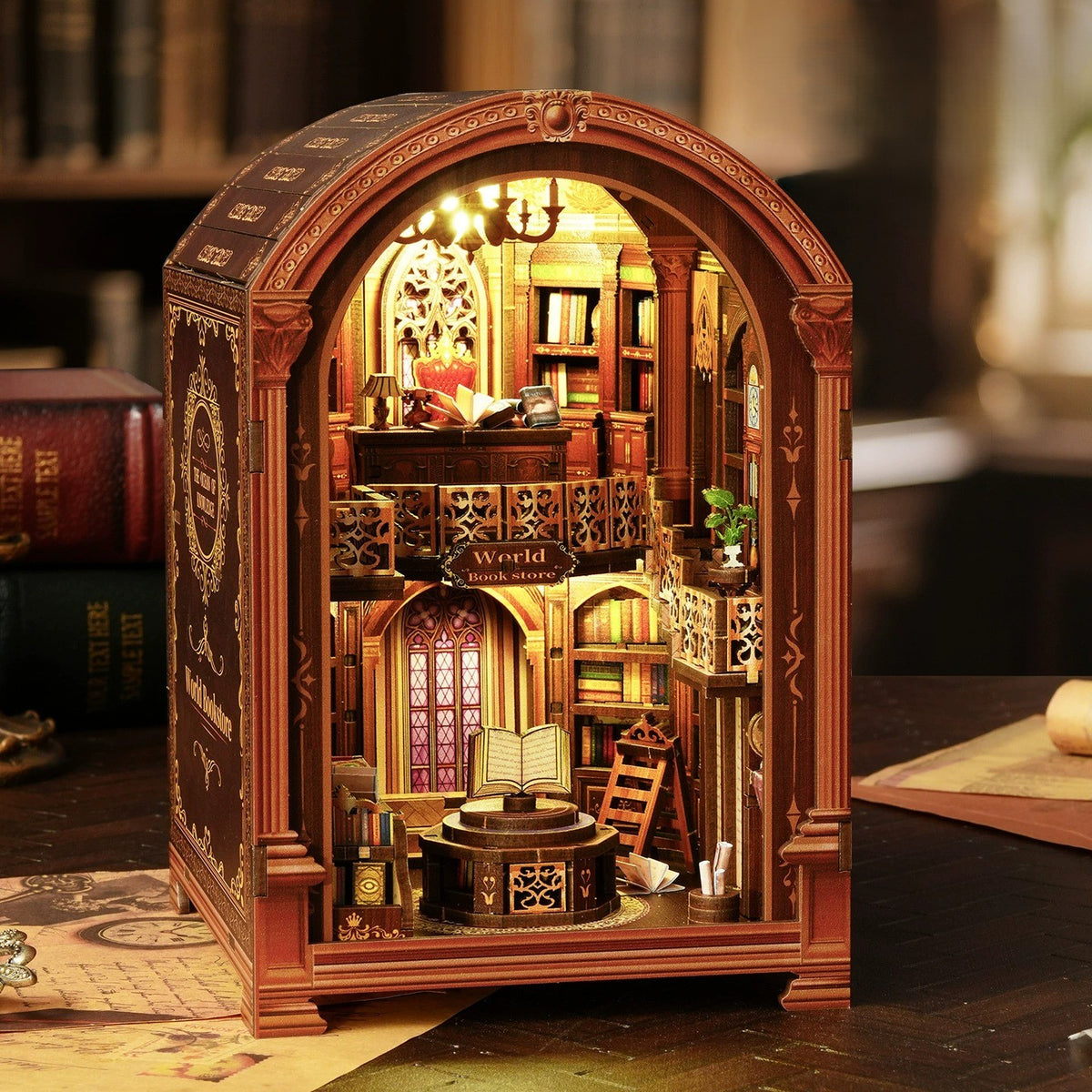 Front view of the completed vintage library book nook glowing softly in the dark, showcasing its warm lighting and detailed