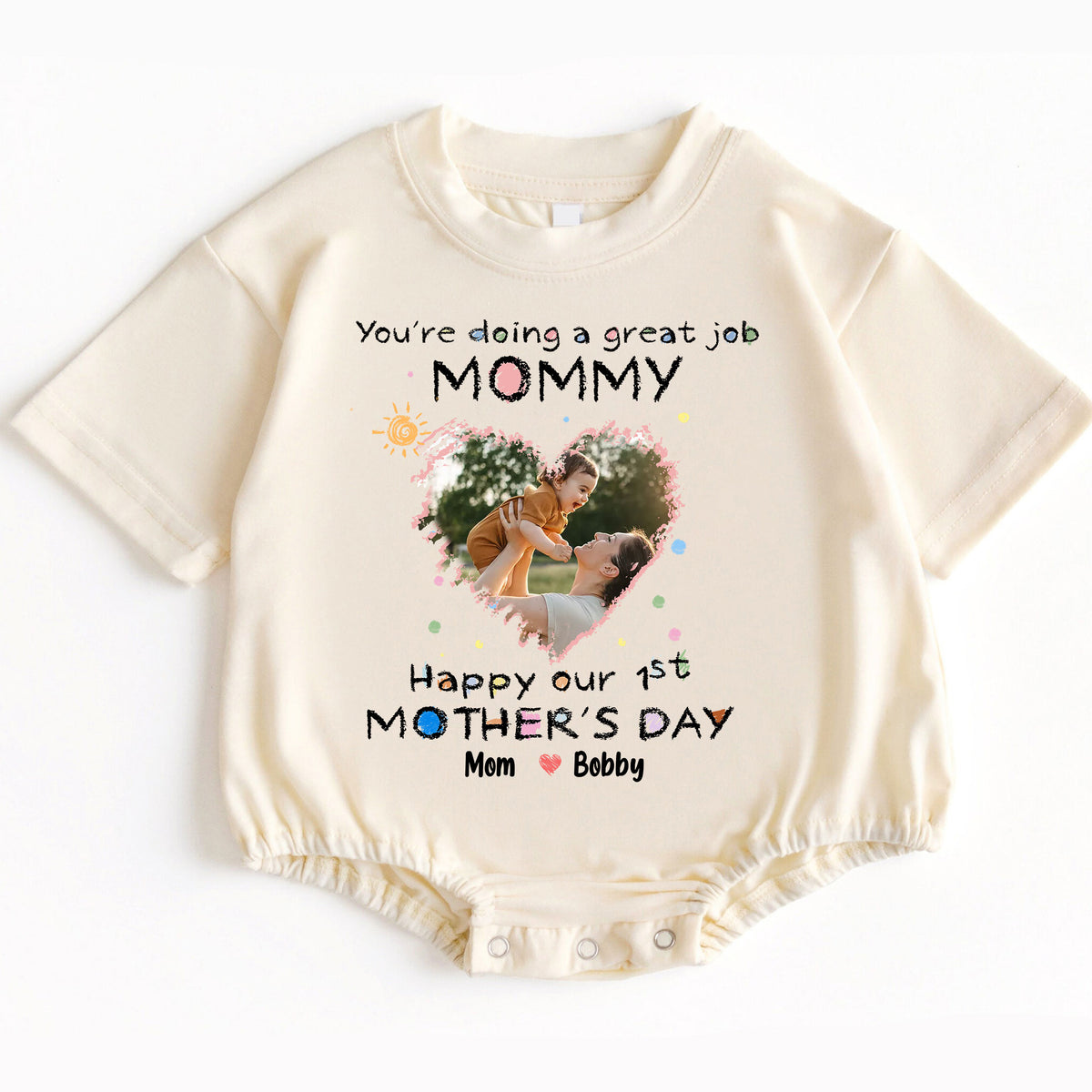 Make her first Mother's Day truly extraordinary and memorable with the "You're Doing A Great Job Mommy - Happy Our First Mother's Day" Romper Baby Bodysuit. Order yours today and give the gift of love, comfort, and a cherished memory!