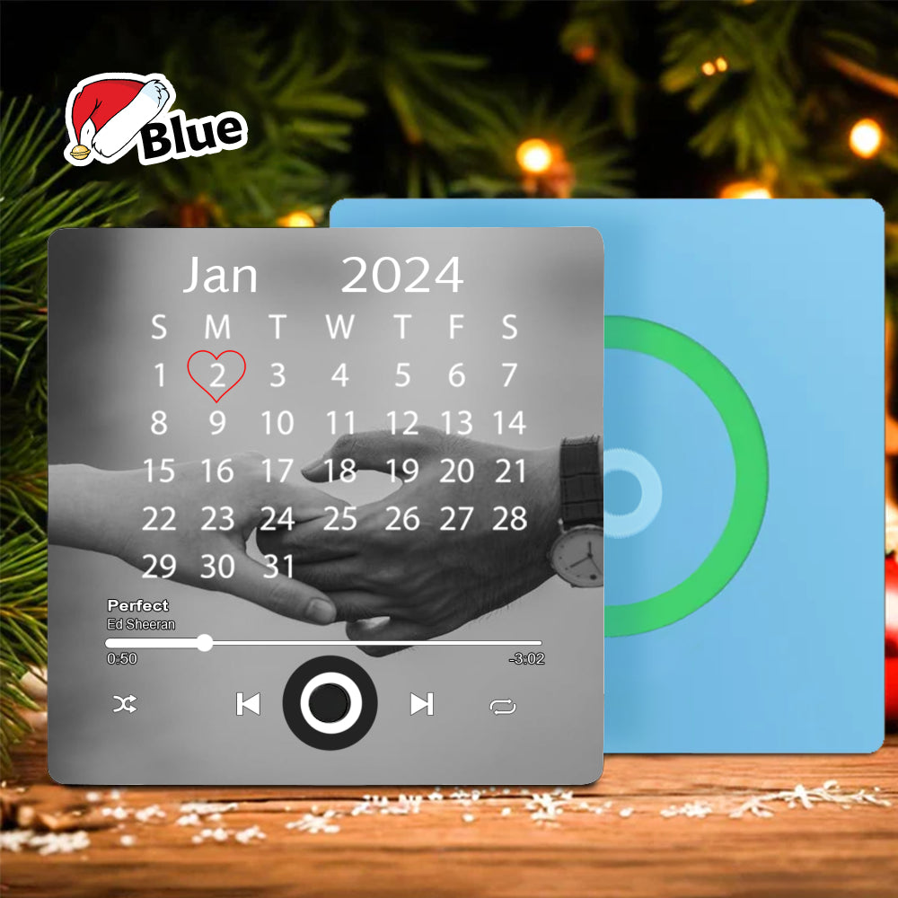 Personalized Calendar & Music Fridge Magnet displayed in front of a blue back option on a rustic wooden table with Christmas