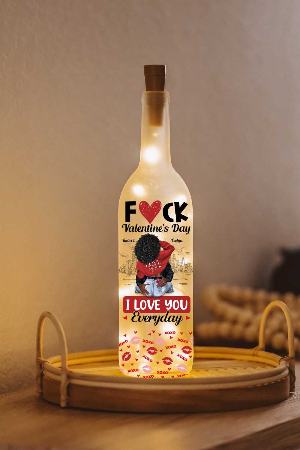 Couple personalized custom bottle lamp on a wooden tray, glowing with warm fairy lights.