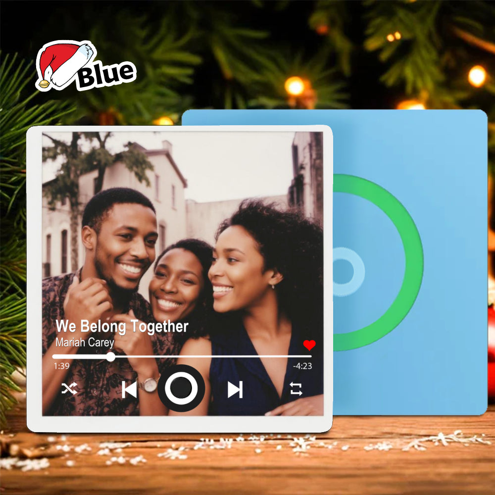 Custom Photo Musical Fridge Magnet in blue color variant resting on a wooden surface