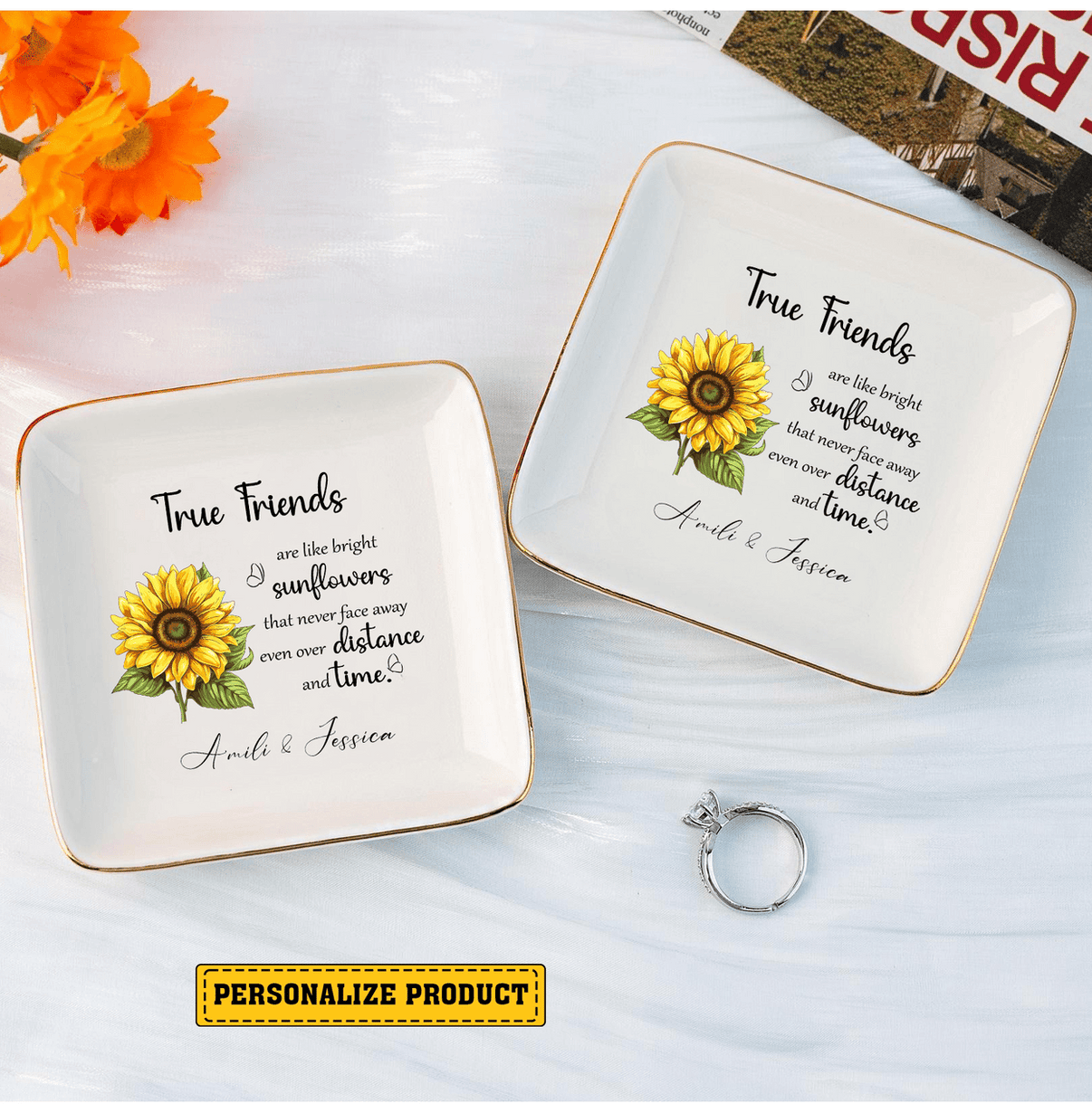 White square ceramic ring dish with gold rim, featuring a sunflower illustration, butterflies, and best friend quote