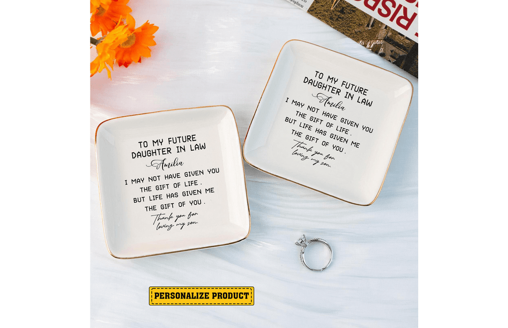 White square ceramic jewelry dish with gold rim and personalized script name for a future daughter in law.