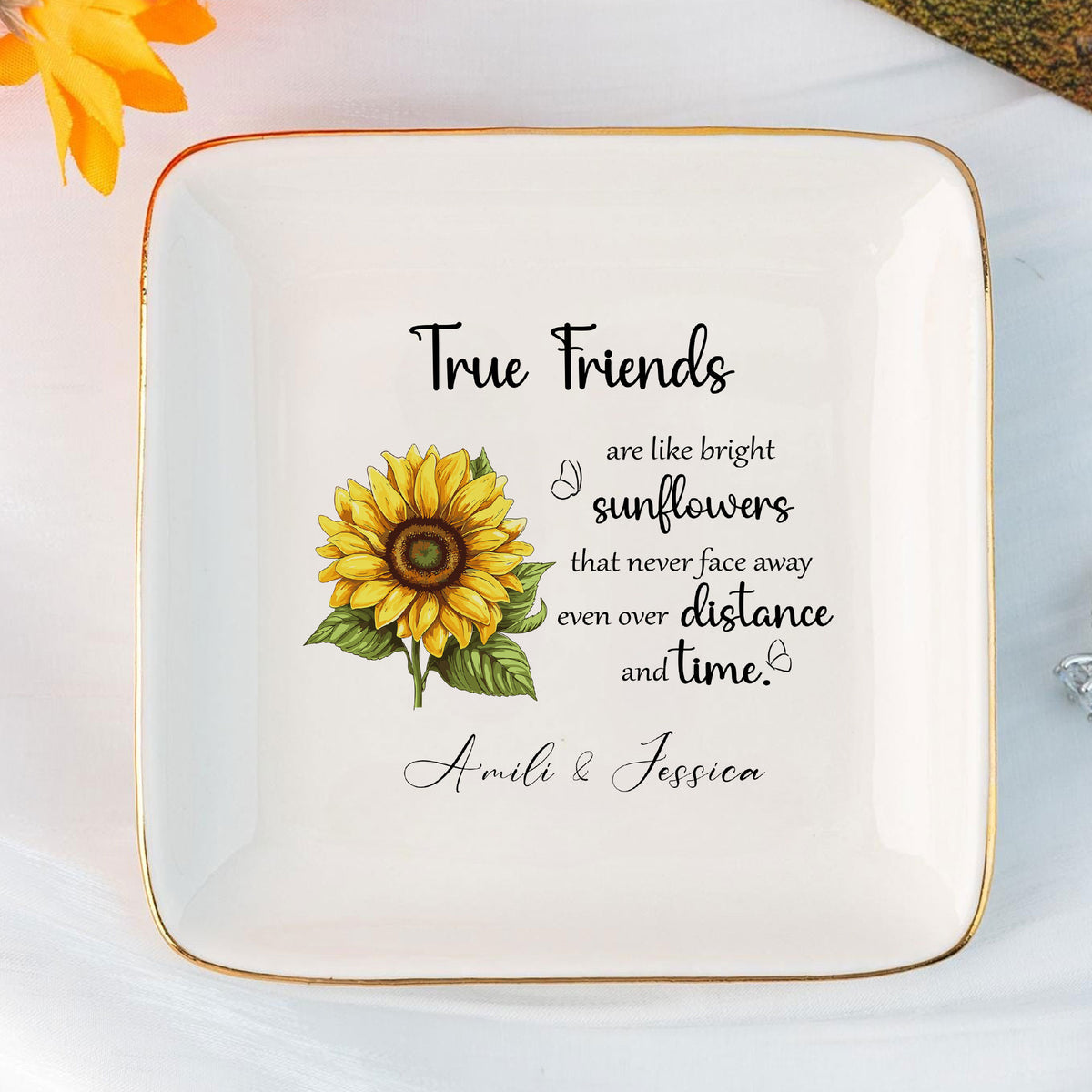 Custom ring dish for best friend featuring sunflower design and gold trim on white surface.