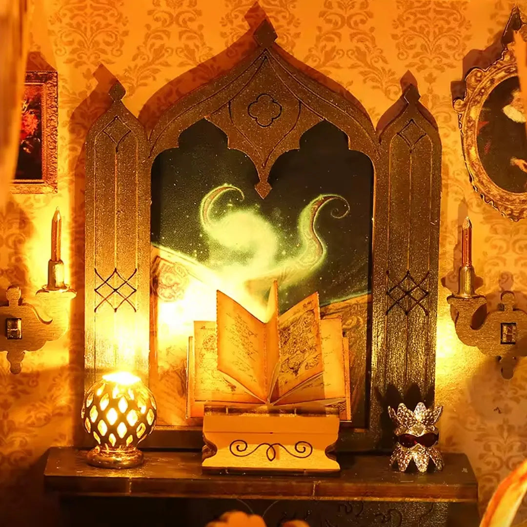 Detailed book nook puzzle interior highlighting a magical glowing book open on a desk beneath a framed picture and Gothic