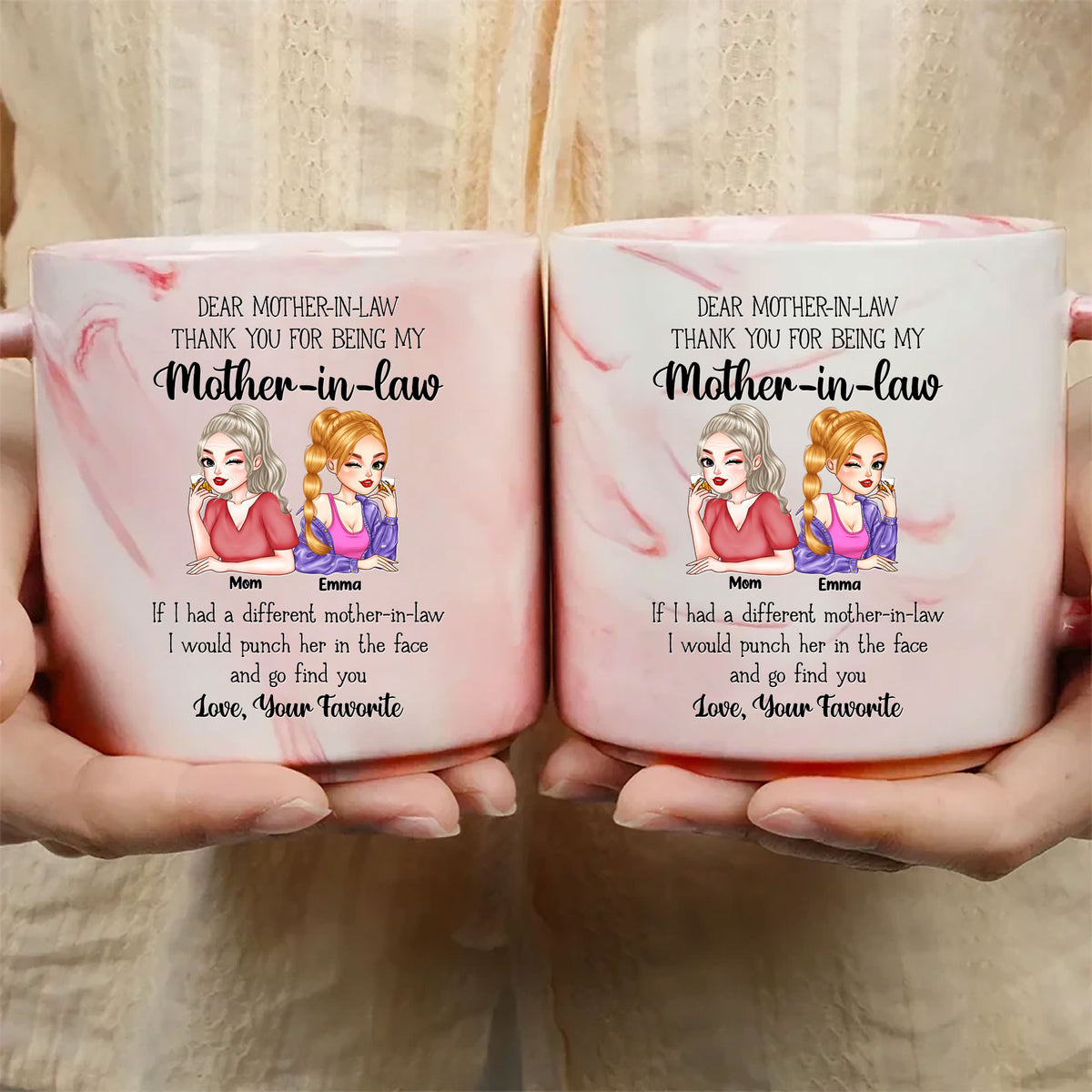 Two hands holding pink marble mugs with custom mother-in-law avatar art and funny text for Mother's Day gift.