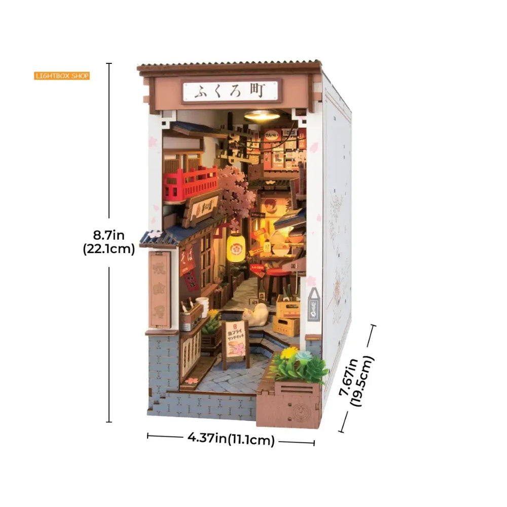 Japanese street diorama book nook kit showing full front view with dimension arrows.
